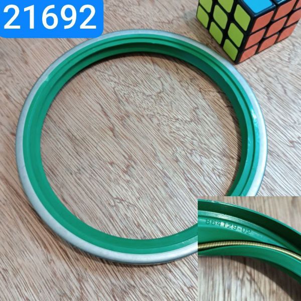 Сальник 142х168х16 КАМАЗ маточина задня в металі NBR зелений латун. пружиною