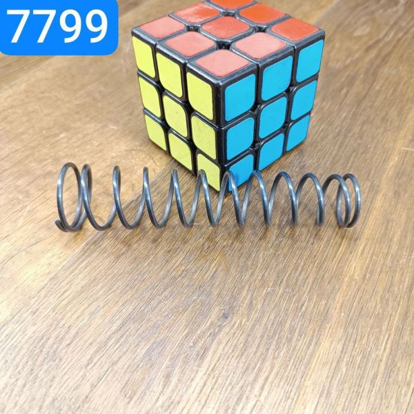 Пружина поворотна поршня головного циліндра гальма ГАЗ 66 53 КРАЗ 250-1602560 пружинна сталь